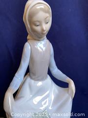 MaxSold Auction: 2 Figurines: Lladro Girl With a Rabbit #4826 and NAO by Lladro Peasant Girl With Rabbits - Oak Park (California, USA) PARTNER MANAGED Estate Sale Online Auction - Pesto Way