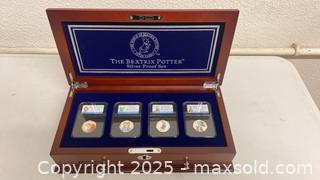 MaxSold Auction: Beatrix Potter Silver Proof Coin Set &#38; Peanuts Snoopy Coins - Oak Park (California, USA) PARTNER MANAGED Estate Sale Online Auction - Pesto Way