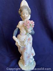 MaxSold Auction: Lladro Figurine Valencian Girl with Flowers #1304 and Lolita #5192 - Oak Park (California, USA) PARTNER MANAGED Estate Sale Online Auction - Pesto Way