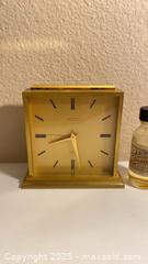 MaxSold Auction: Swiss Made Looping 8-Day Alarm Desk Clock - Oak Park (California, USA) PARTNER MANAGED Estate Sale Online Auction - Pesto Way