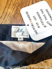 MaxSold Auction: 5 Skirts - fits 10-12 - 2 NWT incl Milly sz 12 &#38; CK black skirt; GRYPHON is a navy textured LEATHER skirt  - North York (Ontario, Canada) SELLER MANAGED Downsizing Online Auction - Country Lane