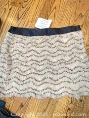 MaxSold Auction: 5 Skirts - fits 10-12 - 2 NWT incl Milly sz 12 &#38; CK black skirt; GRYPHON is a navy textured LEATHER skirt  - North York (Ontario, Canada) SELLER MANAGED Downsizing Online Auction - Country Lane