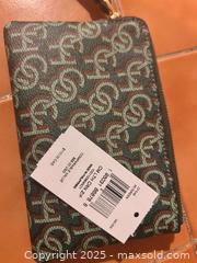 MaxSold Auction: New Green coach wristlet - Easton (Pennsylvania, USA) SELLER MANAGED Downsizing Online Auction - South 12th Street