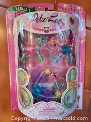 MaxSold Auction: Petz-let series 1 and pink headphones  - Easton (Pennsylvania, USA) SELLER MANAGED Downsizing Online Auction - South 12th Street