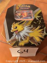 MaxSold Auction: Pokémon trading cards set with tin - Easton (Pennsylvania, USA) SELLER MANAGED Downsizing Online Auction - South 12th Street