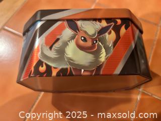 MaxSold Auction: Pokémon trading cards set with tin - Easton (Pennsylvania, USA) SELLER MANAGED Downsizing Online Auction - South 12th Street