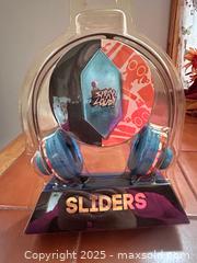 MaxSold Auction: Slider headphones with notebook and two games  - Easton (Pennsylvania, USA) SELLER MANAGED Downsizing Online Auction - South 12th Street