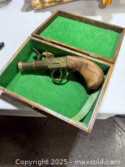 MaxSold Auction: Decorative 19th-Century Style Flintlock/Pepperbox Replica - Windsor (Ontario, Canada) PARTNER MANAGED Downsizing Online Auction - Ashland Drive