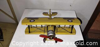 MaxSold Auction: Decorative Model Biplane K3215 - Stamped Painted Metal - Windsor (Ontario, Canada) PARTNER MANAGED Downsizing Online Auction - Ashland Drive