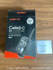 MaxSold Auction: Godox Cells II-C Wireless Flash Trigger Transceiver Pair - Windsor (Ontario, Canada) PARTNER MANAGED Downsizing Online Auction - Ashland Drive