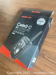 MaxSold Auction: Godox Cells II-C Wireless Flash Trigger Transceiver Pair - Windsor (Ontario, Canada) PARTNER MANAGED Downsizing Online Auction - Ashland Drive