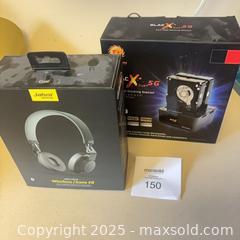 MaxSold Auction: Jabra Move Wireless Headphones, Thermaltake BlacX Duet 5G Dock and accessories (Lot) - Windsor (Ontario, Canada) PARTNER MANAGED Downsizing Online Auction - Ashland Drive