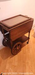 MaxSold Auction: Mid-Century Solid Wood Serving Cart with Removable Tray - Windsor (Ontario, Canada) PARTNER MANAGED Downsizing Online Auction - Ashland Drive