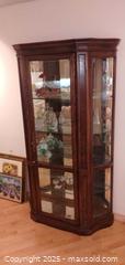 MaxSold Auction: Oak-Tone Wood Curio Cabinet with Glass Sides &#38; Mirrored Back - Windsor (Ontario, Canada) PARTNER MANAGED Downsizing Online Auction - Ashland Drive