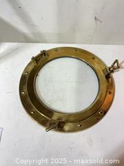 MaxSold Auction: Polished Brass Decorative Ship Porthole Window - Windsor (Ontario, Canada) PARTNER MANAGED Downsizing Online Auction - Ashland Drive