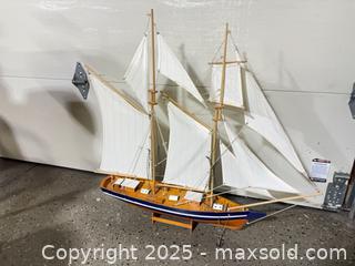 MaxSold Auction: Wooden Two-Masted Schooner Model with Stand &#38; Anchor - Windsor (Ontario, Canada) PARTNER MANAGED Downsizing Online Auction - Ashland Drive
