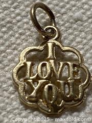 MaxSold Auction: 10K Solid Gold Quatrefoil Pendant with &#39;I LOVE YOU&#39; Text - Toronto (Ontario, Canada) SELLER MANAGED Downsizing Online Auction - O'Connor Drive (CONDO)