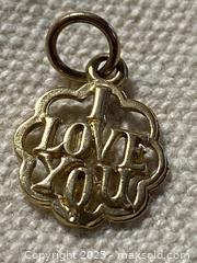 MaxSold Auction: 10K Solid Gold Quatrefoil Pendant with &#39;I LOVE YOU&#39; Text - Toronto (Ontario, Canada) SELLER MANAGED Downsizing Online Auction - O'Connor Drive (CONDO)