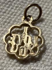 MaxSold Auction: 10K Solid Gold Quatrefoil Pendant with &#39;I LOVE YOU&#39; Text - Toronto (Ontario, Canada) SELLER MANAGED Downsizing Online Auction - O'Connor Drive (CONDO)