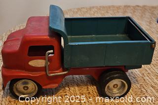 MaxSold Auction: 1996 Tonka 1949 Red Metal Dump Truck  - Riverview (Florida, USA) SELLER MANAGED Downsizing Online Auction - Holly Heath Drive