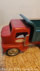 MaxSold Auction: 1996 Tonka 1949 Red Metal Dump Truck  - Riverview (Florida, USA) SELLER MANAGED Downsizing Online Auction - Holly Heath Drive