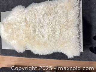 MaxSold Auction: 2 Australian sheepskin rugs - Vancouver (British Columbia, Canada) SELLER MANAGED Downsizing Online Auction - West 30th Avenue