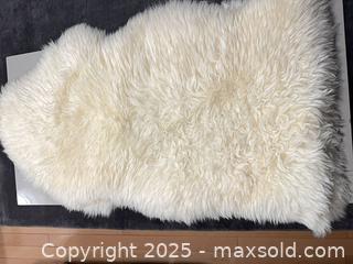 MaxSold Auction: 2 Australian sheepskin rugs - Vancouver (British Columbia, Canada) SELLER MANAGED Downsizing Online Auction - West 30th Avenue