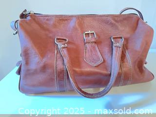 MaxSold Auction: Leather duffle bag  - Vancouver (British Columbia, Canada) SELLER MANAGED Downsizing Online Auction - West 30th Avenue