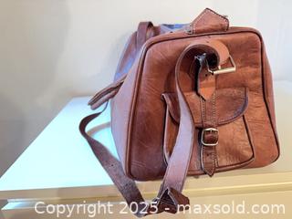 MaxSold Auction: Leather duffle bag  - Vancouver (British Columbia, Canada) SELLER MANAGED Downsizing Online Auction - West 30th Avenue
