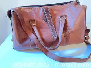 MaxSold Auction: Leather duffle bag  - Vancouver (British Columbia, Canada) SELLER MANAGED Downsizing Online Auction - West 30th Avenue