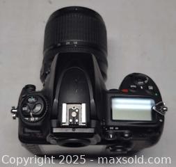 MaxSold Auction: NIKON D700 Camera with lens and extra lens and more - Toronto (Ontario, Canada) PARTNER MANAGED Reseller Online Auction - Queen Street West.