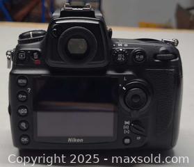 MaxSold Auction: NIKON D700 Camera with lens and extra lens and more - Toronto (Ontario, Canada) PARTNER MANAGED Reseller Online Auction - Queen Street West.