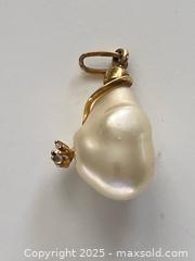 MaxSold Auction: Large White Baroque Pearl Pendant with Small Diamond Accent and a Gold Bale Sterling. Gold Vermeil  - St. Catharines (Ontario, Canada) SELLER MANAGED Estate Sale Online Auction - Monique Crescent
