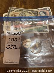 MaxSold Auction: North American Currency - Saanich (British Columbia, Canada) PARTNER MANAGED Moving Online Auction - Annabern Crescent