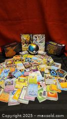 MaxSold Auction: Pokemon card lot - Hamilton (Ontario, Canada) SELLER MANAGED Downsizing Online Auction - Hatt Street