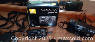 MaxSold Auction: Nikon Coolpix S6800 and Bags - Oakville (Ontario, Canada) PARTNER MANAGED Estate Sale Online Auction -  Dunedin Road