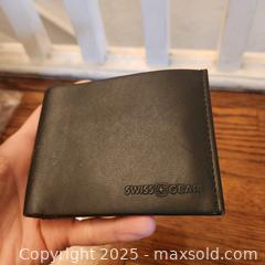 MaxSold Auction: swiss leather wallet - Toronto (Ontario, Canada) SELLER MANAGED Downsizing Online Auction - Avenue Road
