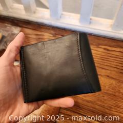 MaxSold Auction: swiss leather wallet - Toronto (Ontario, Canada) SELLER MANAGED Downsizing Online Auction - Avenue Road
