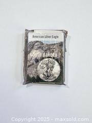 MaxSold Auction: 2021 American Silver Eagle $1 coin South Dakota - Esquimalt (British Columbia, Canada) PARTNER MANAGED Reseller Online Auction - Lampson Street