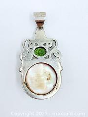 MaxSold Auction: 925 Sterling Silver Pearl and Peridot Pendant 2” - Esquimalt (British Columbia, Canada) PARTNER MANAGED Reseller Online Auction - Lampson Street