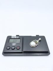 MaxSold Auction: 925 Sterling Silver Pearl and Peridot Pendant 2” - Esquimalt (British Columbia, Canada) PARTNER MANAGED Reseller Online Auction - Lampson Street