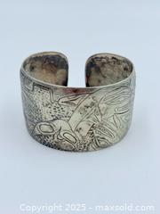 MaxSold Auction: First Nations Sterling Silver Cuff 58.99g - Esquimalt (British Columbia, Canada) PARTNER MANAGED Reseller Online Auction - Lampson Street