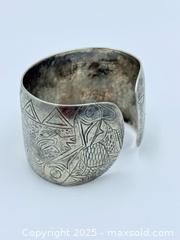 MaxSold Auction: First Nations Sterling Silver Cuff 58.99g - Esquimalt (British Columbia, Canada) PARTNER MANAGED Reseller Online Auction - Lampson Street