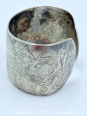 MaxSold Auction: First Nations Sterling Silver Cuff 58.99g - Esquimalt (British Columbia, Canada) PARTNER MANAGED Reseller Online Auction - Lampson Street