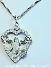 MaxSold Auction: Sterling Silver Cherub Heart Necklace - Esquimalt (British Columbia, Canada) PARTNER MANAGED Reseller Online Auction - Lampson Street