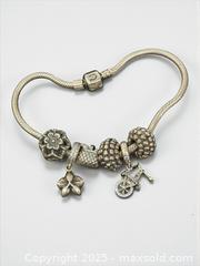 MaxSold Auction: Sterling Silver Pandora Bead Bracelet - Esquimalt (British Columbia, Canada) PARTNER MANAGED Reseller Online Auction - Lampson Street