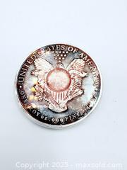 MaxSold Auction: Sunshine Minting (SMI) 1-Ounce 999 Silver Round - Esquimalt (British Columbia, Canada) PARTNER MANAGED Reseller Online Auction - Lampson Street