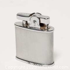 MaxSold Auction: 1960s Ronson &#34;Triumph&#34; lighter - Toronto (Ontario, Canada) SELLER MANAGED Downsizing Online Auction - Nassau Street