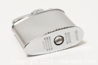 MaxSold Auction: 1960s Ronson &#34;Triumph&#34; lighter - Toronto (Ontario, Canada) SELLER MANAGED Downsizing Online Auction - Nassau Street