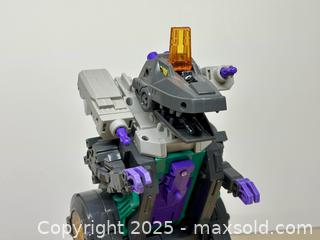 MaxSold Auction: 1986 TRANSFORMERS Trypticon - Toronto (Ontario, Canada) SELLER MANAGED Downsizing Online Auction - Nassau Street